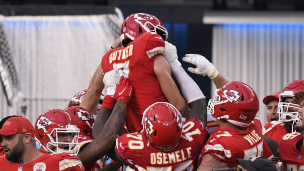 Sep 20, 2020; Inglewood, California, USA; Kansas City Chiefs kicker Harrison Butker (7) celebrates with teammates after kicking the game-winning 58-yard field goal against the Los Angeles Chargers during overtime at SoFi Stadium. Mandatory Credit: Robert Hanashiro-USA TODAY Sports